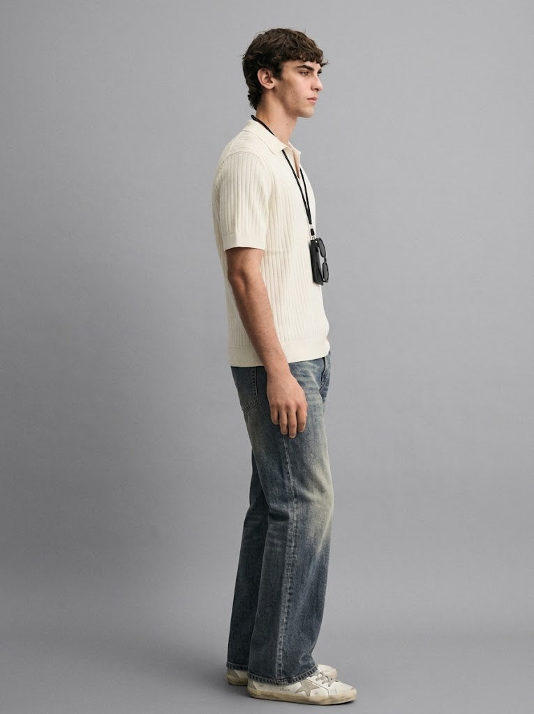 VINTAGE WASHED FLARED JEANS